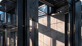 Steel and glass building interior in sunlight